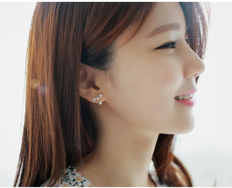 Diamond-Studded Snowflake Earrings, Elegant Design